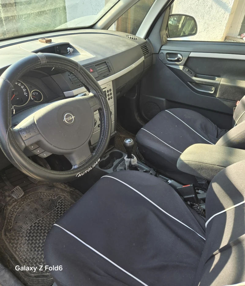 Opel Meriva 16v, снимка 9 - Автомобили и джипове - 52646417