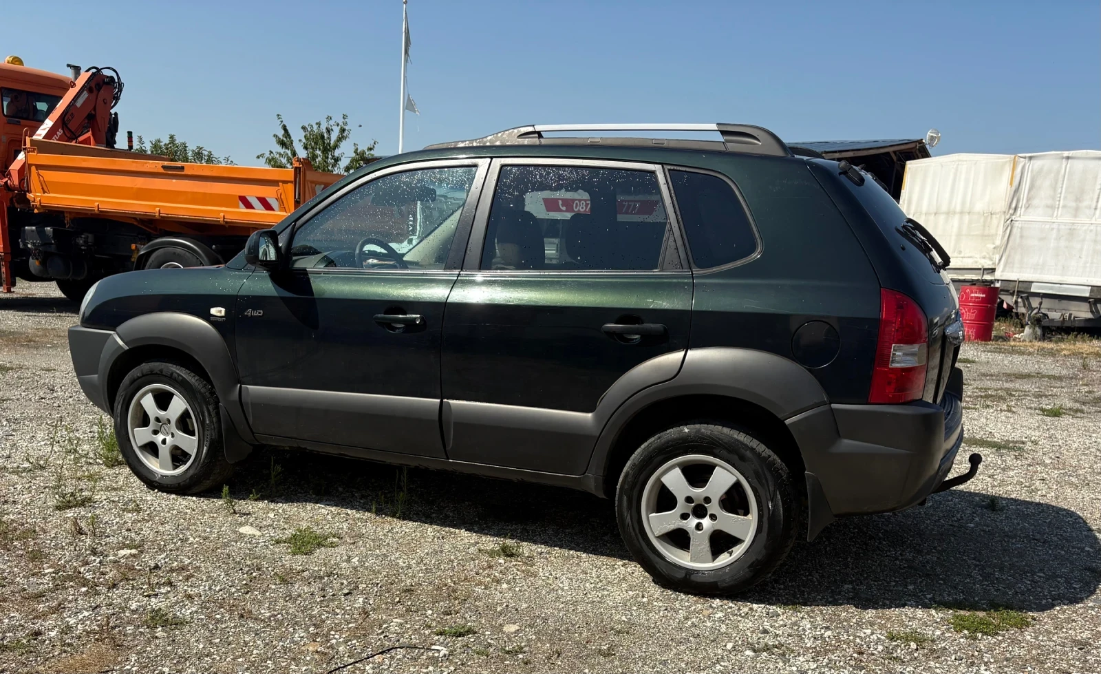 Hyundai Tucson 2.0/140, снимка 6 - Автомобили и джипове - 55611641