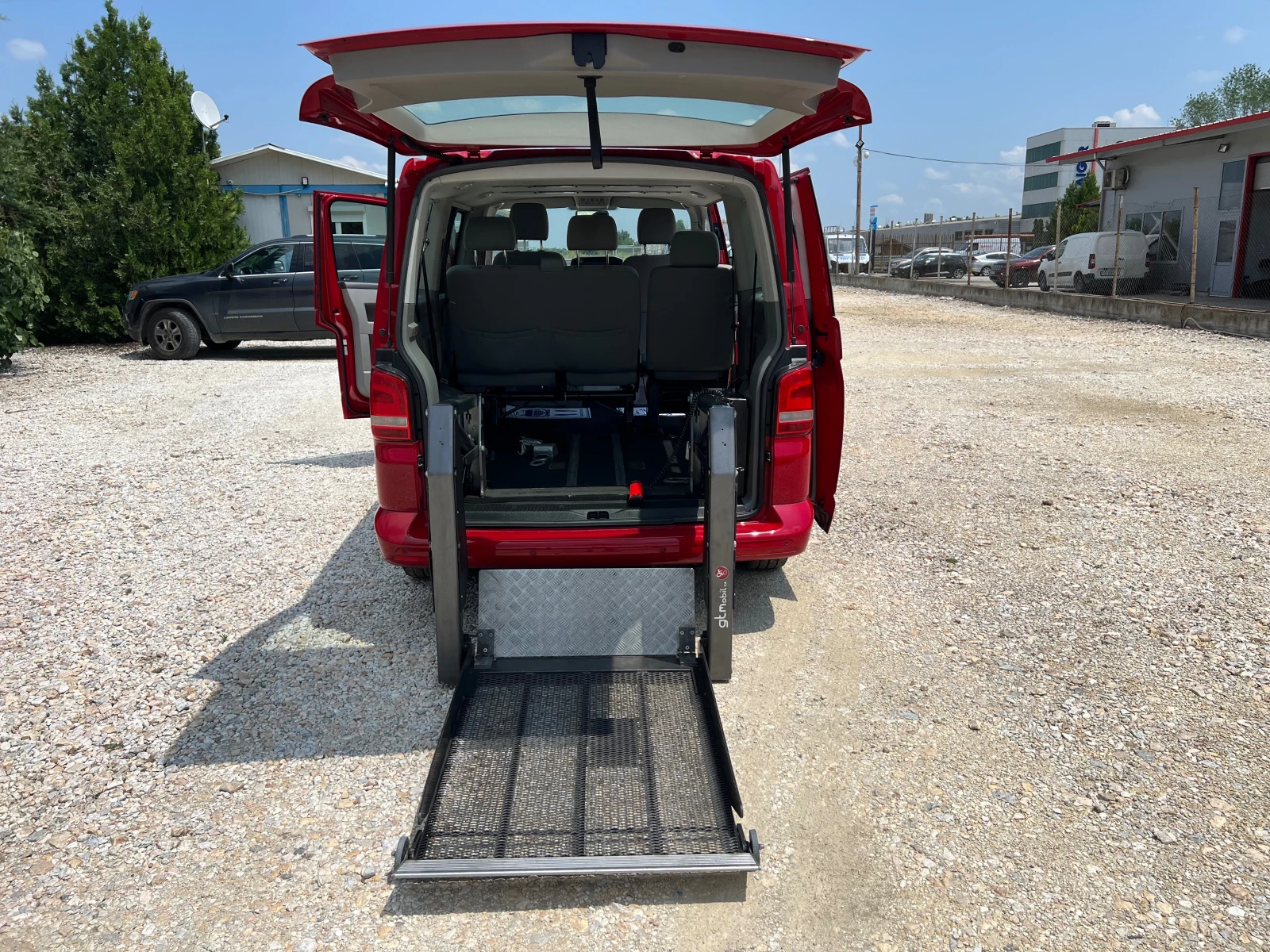 VW Caravelle 2.0 TDI 4x4 T5 РАМПА, снимка 11 - Бусове и автобуси - 54831380