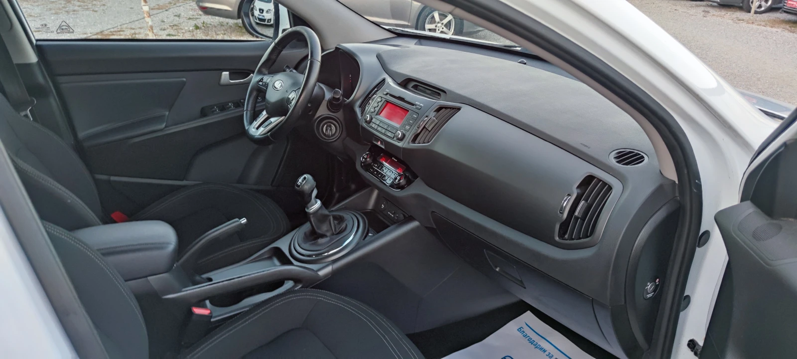 Kia Sportage 2.0CRDI 4x4, снимка 14 - Автомобили и джипове - 56353462
