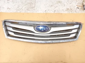 Решетка между фарове Субару Аутбек 11г.