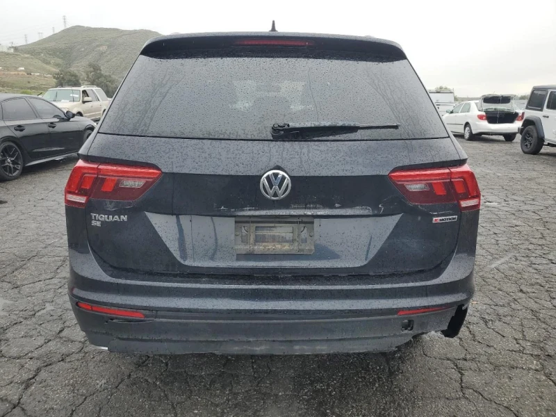 VW Tiguan, снимка 6 - Автомобили и джипове - 49602108