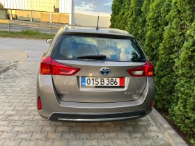 Toyota Auris 1.8Hybrid Lounge 136к.с Перфектна!!!, снимка 7