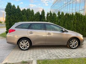 Toyota Auris 1.8Hybrid Lounge 136к.с Перфектна!!!, снимка 10