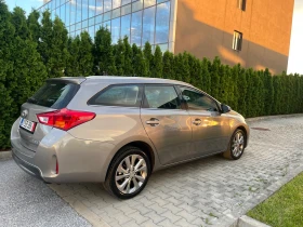 Toyota Auris 1.8Hybrid Lounge 136к.с Перфектна!!!, снимка 9