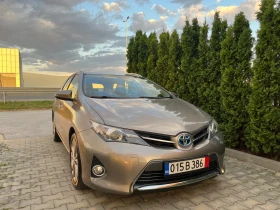 Toyota Auris 1.8Hybrid Lounge 136к.с Перфектна!!!, снимка 4