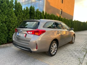 Toyota Auris 1.8Hybrid Lounge 136к.с Перфектна!!!, снимка 8
