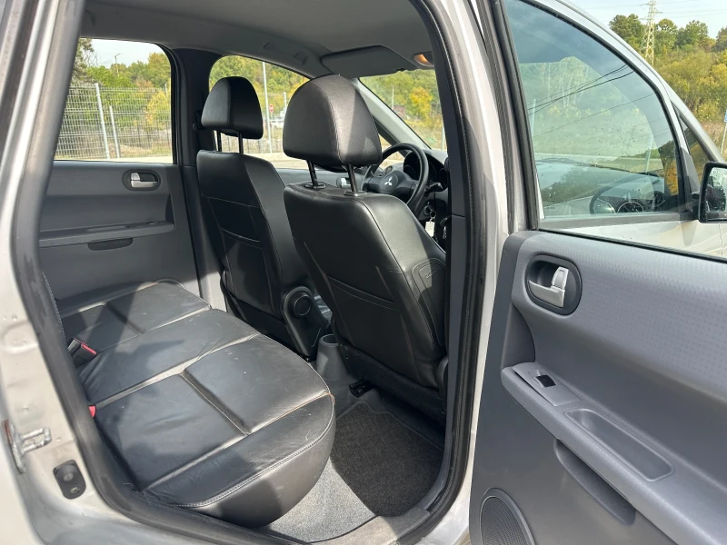 Mitsubishi Colt 1.3-6-Speed-AUTOMAT-КОЖА-БЕЗ-КОРОЗИЯ!, снимка 13 - Автомобили и джипове - 52147549