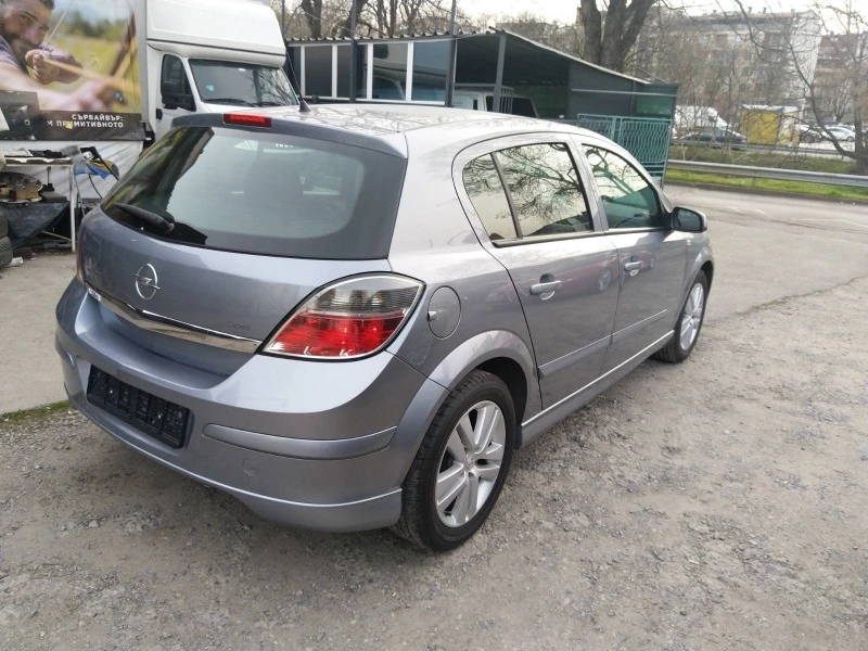 Opel Astra 1.4i 16v -FACELIFT, снимка 4 - Автомобили и джипове - 46214173