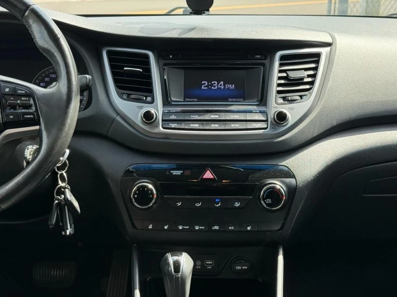 Hyundai Tucson PREMIUM * * CARFAX * * АВТО КРЕДИТ * * , снимка 10 - Автомобили и джипове - 52869448