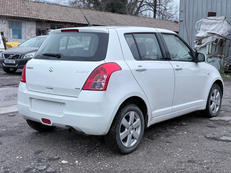 Suzuki Swift 1.3 4х4, снимка 4 - Автомобили и джипове - 53287173