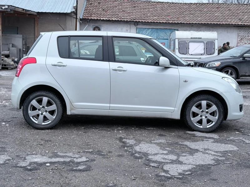 Suzuki Swift 1.3 4х4, снимка 7 - Автомобили и джипове - 53287173