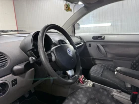 VW New beetle 1.9 TDI 90 к. с., снимка 13