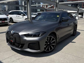 ������ BMW i4