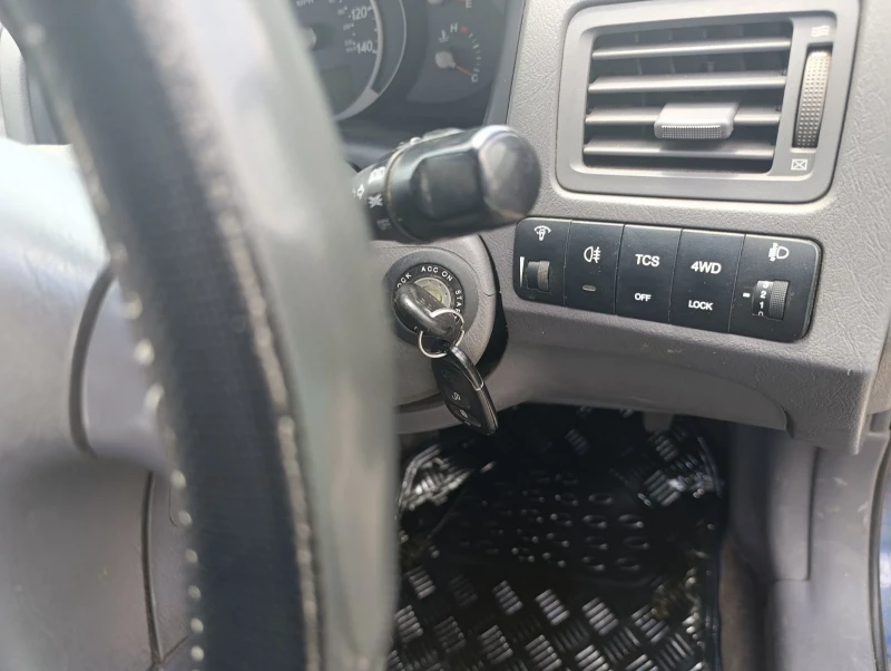 Hyundai Tucson 2.0 CRDI 113 к.с. 4х4 Automatic , снимка 14 - Автомобили и джипове - 53288585
