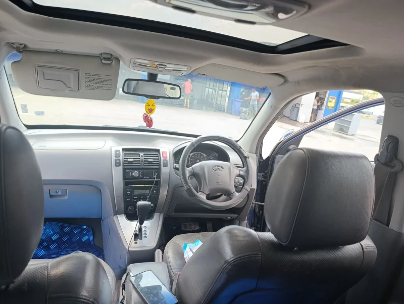 Hyundai Tucson 2.0 CRDI 113 к.с. 4х4 Automatic , снимка 13 - Автомобили и джипове - 53288585