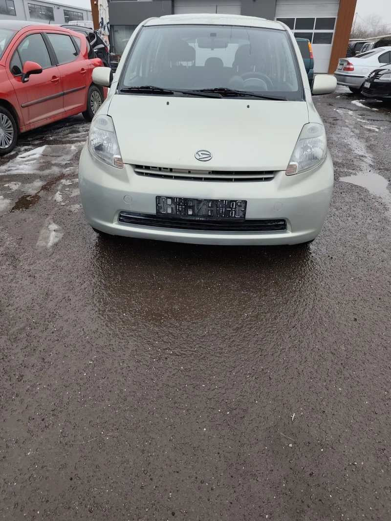 Daihatsu Sirion 1.3 i Автоматик , снимка 11 - Автомобили и джипове - 53204014