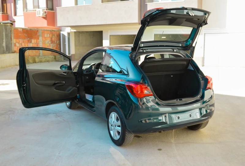 Opel Corsa 64000 км/Клима , снимка 9 - Автомобили и джипове - 46700355