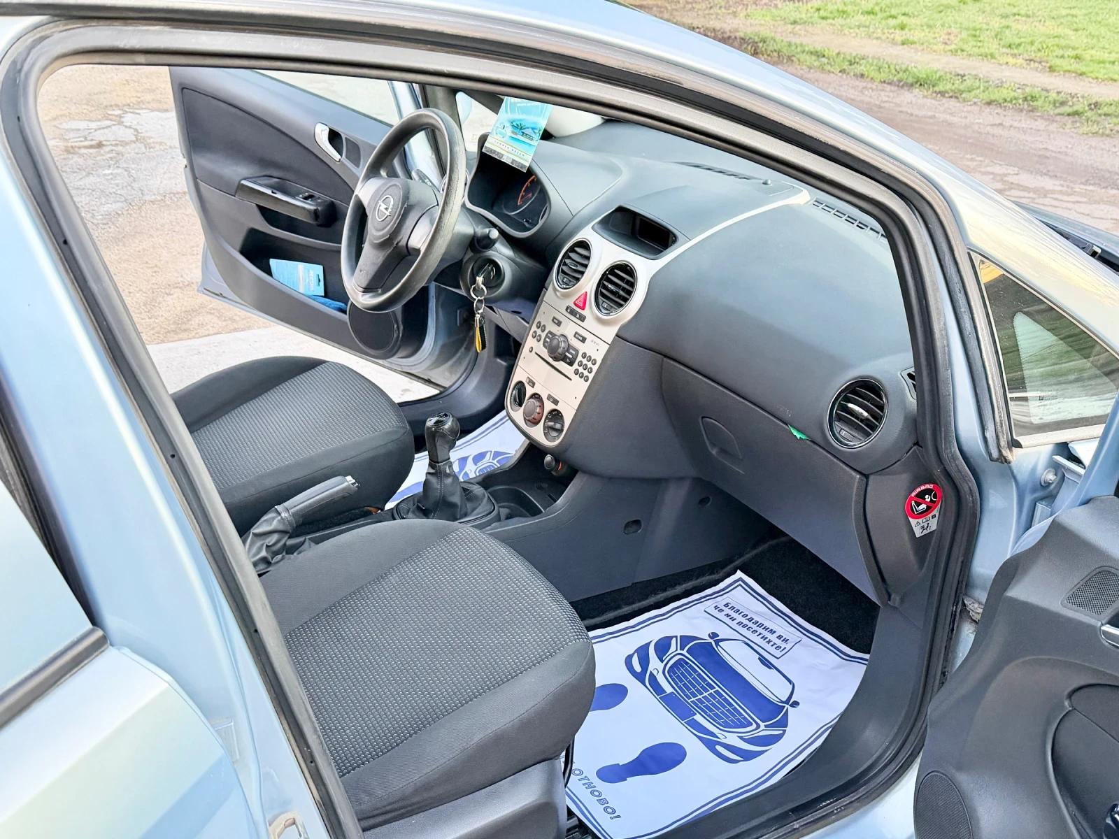 Opel Corsa 1.2 75 к.с 2008г - изображение 10