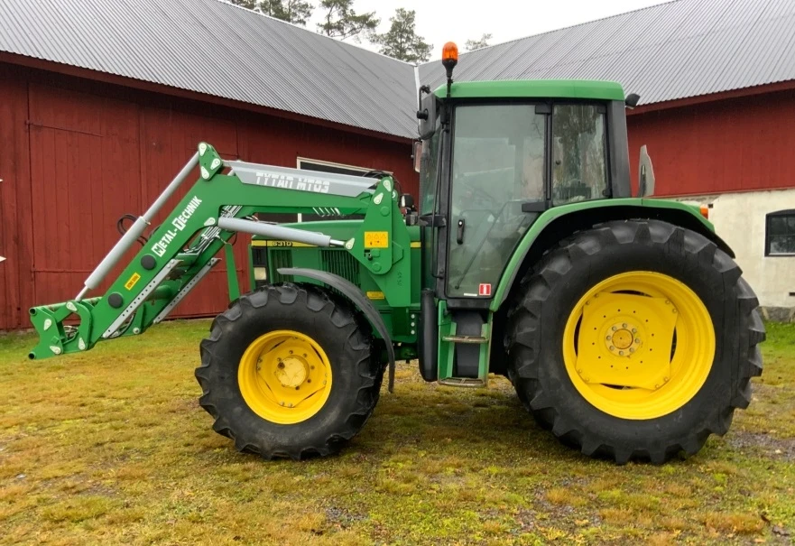 Трактор John Deere 6310