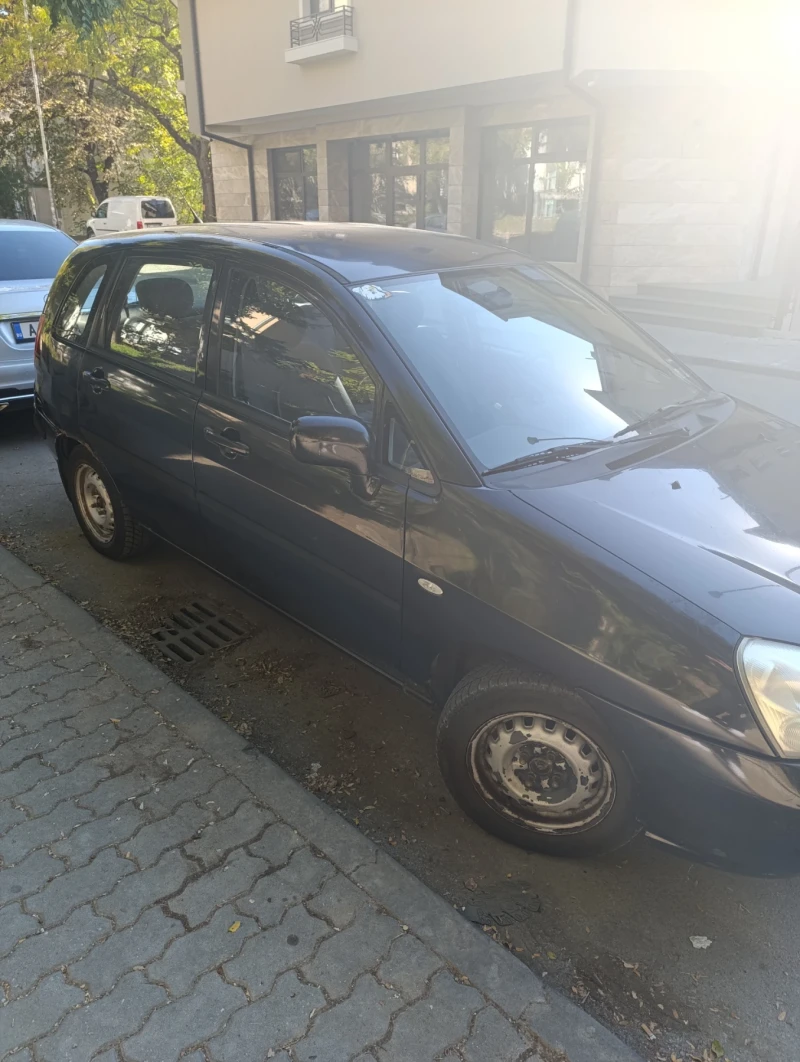 Suzuki Liana 1.6, снимка 9 - Автомобили и джипове - 48958367