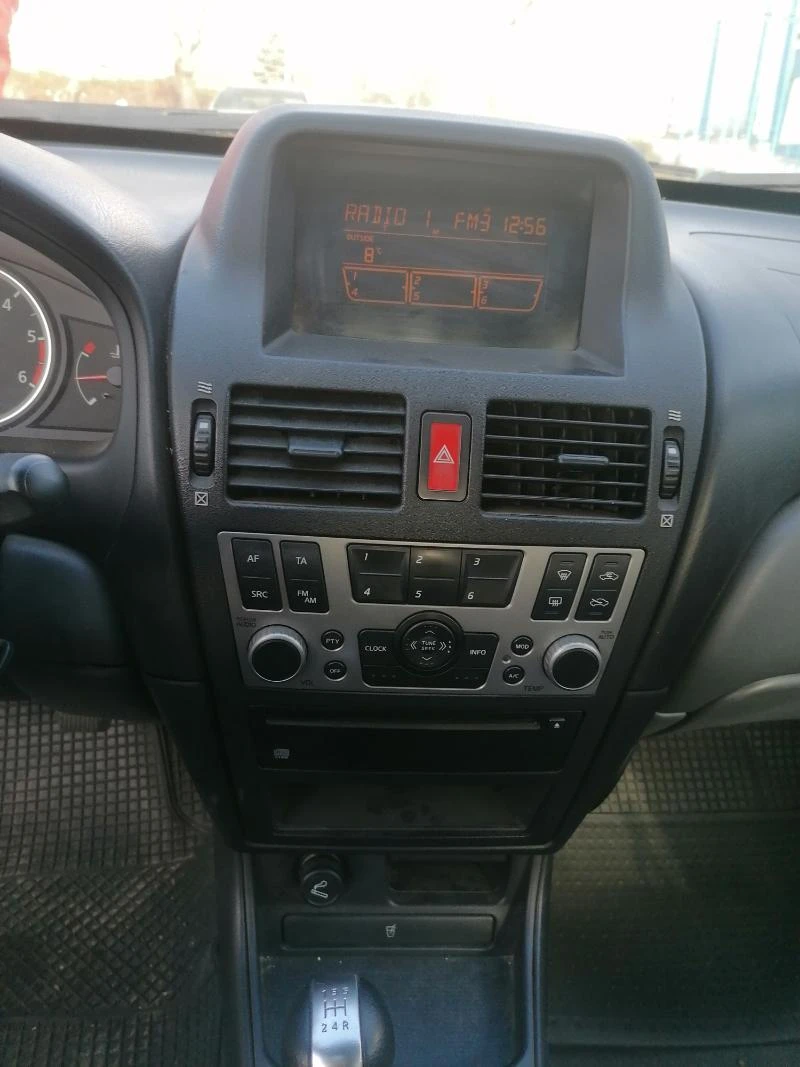 Nissan Almera 1.5 Dci 82кс, снимка 6 - Автомобили и джипове - 31306840