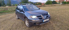 Обява за продажба на Mitsubishi Outlander 2.4i Gaz 4x4 Avtomat ~3 900 лв. - изображение 1