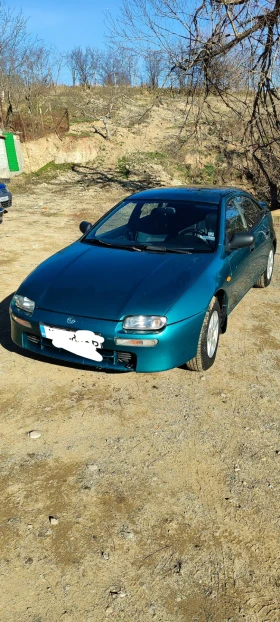 Mazda 323, снимка 1