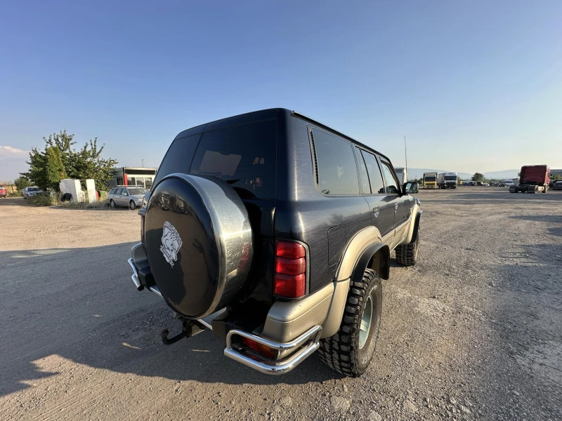 Nissan Patrol, снимка 14 - Автомобили и джипове - 47292977