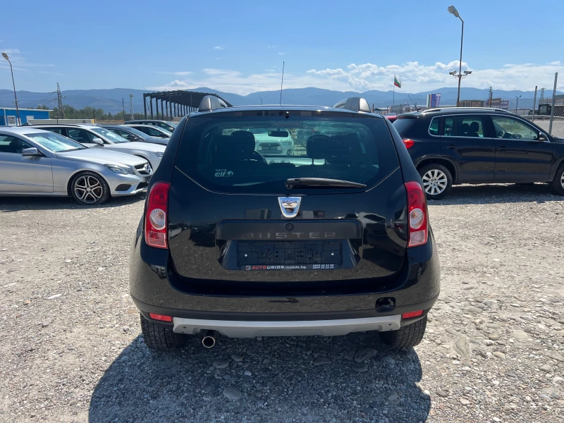 Dacia Duster 1.6 I, снимка 6 - Автомобили и джипове - 51566708