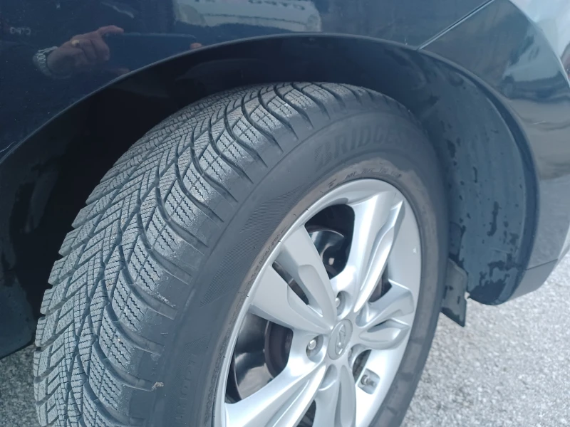 Hyundai IX35 2.0 CRDI 4WD AT, снимка 15 - Автомобили и джипове - 52592854