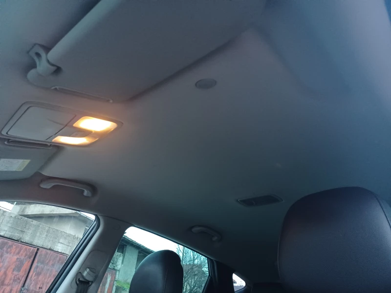 Hyundai IX35 2.0 CRDI 4WD AT, снимка 11 - Автомобили и джипове - 52592854