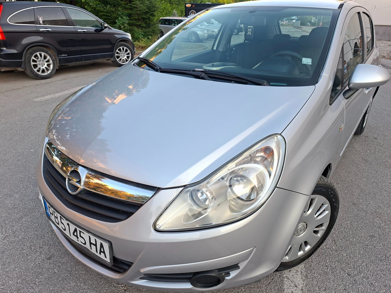 Opel Corsa 1.2 Клима, снимка 12 - Автомобили и джипове - 55980527