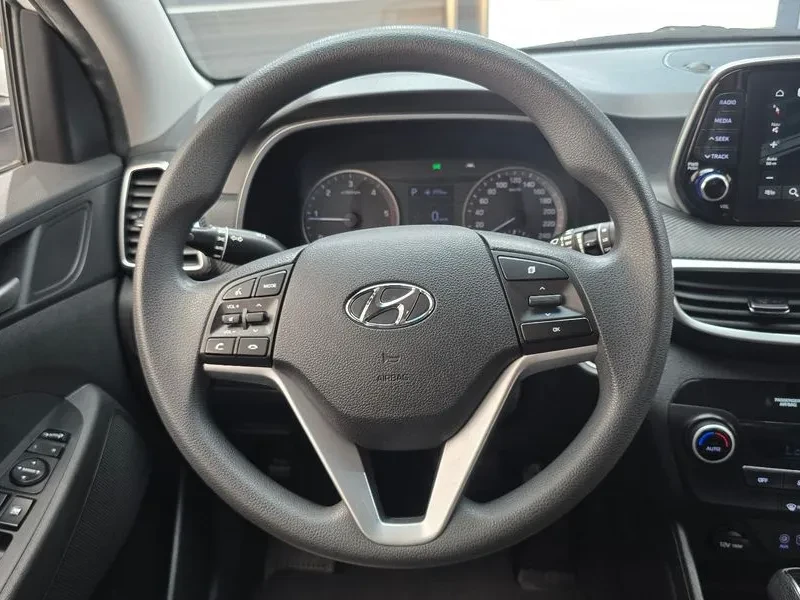 Hyundai Tucson Diesel 1.6 2Wd Smart, снимка 13 - Автомобили и джипове - 55048104