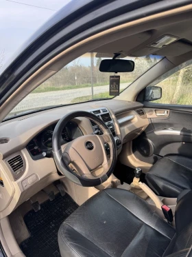 Kia Sportage 2.0 ГАЗ НОВИ ГУМИ ОБСЛУЖЕНА, снимка 9