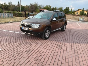 Обява за продажба на Dacia Duster 1, 6i ~11 200 лв. - изображение 1