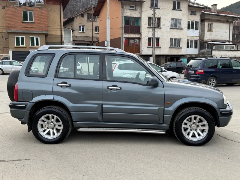 Suzuki Grand vitara 2.0HDI Много Запазен, снимка 7 - Автомобили и джипове - 53558631