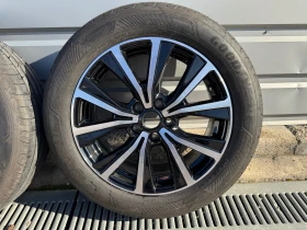        215/55R17  Ford