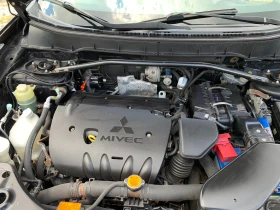 Mitsubishi Outlander 2.4i 4X4 / ГАЗ, снимка 14