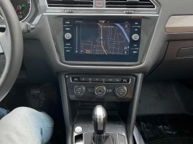 VW Tiguan /4MOTION /CARFAX / Лимитиран салон/Подгрев/Нави/ - 16750 € / 32760.15 лв. - 40873908 10
