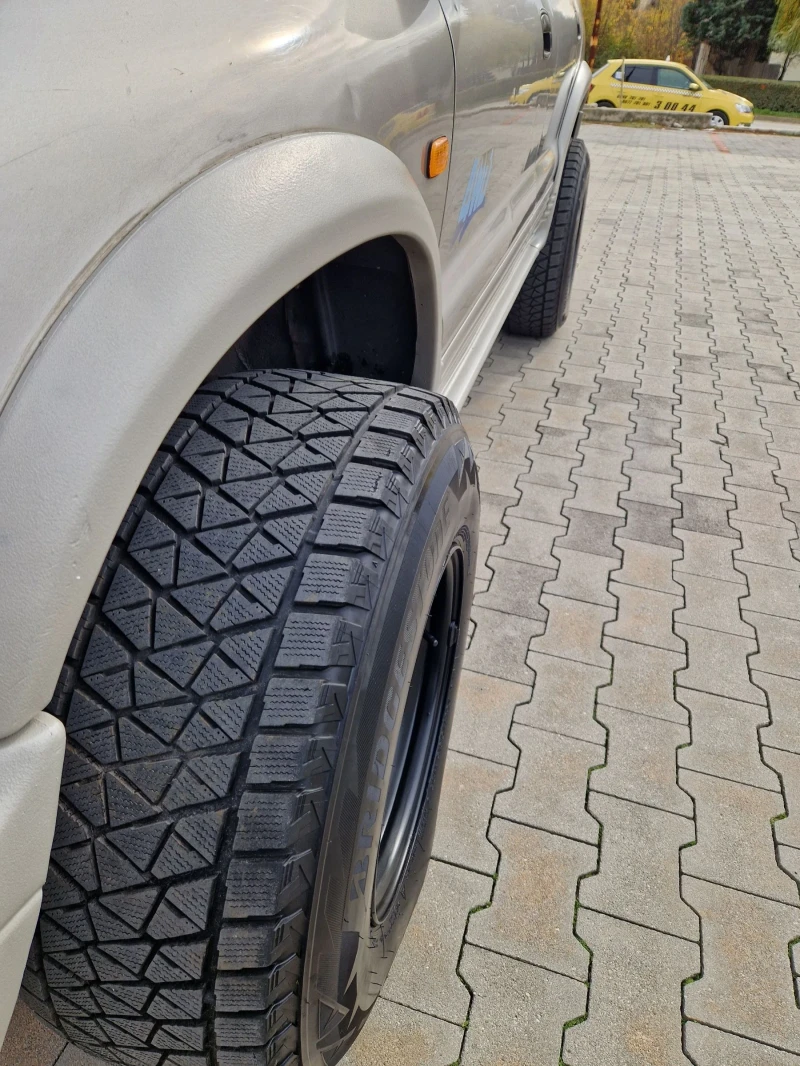 Kia Sportage 2.0 i 128 к.с +  Газ + климатик, снимка 15 - Автомобили и джипове - 52536603