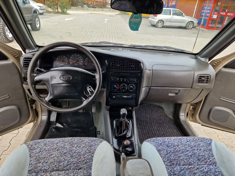 Kia Sportage 2.0 i 128 к.с +  Газ + климатик, снимка 9 - Автомобили и джипове - 52536603
