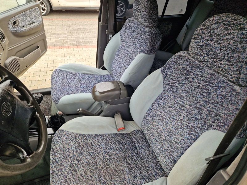 Kia Sportage 2.0 i 128 к.с +  Газ + климатик, снимка 10 - Автомобили и джипове - 52536603