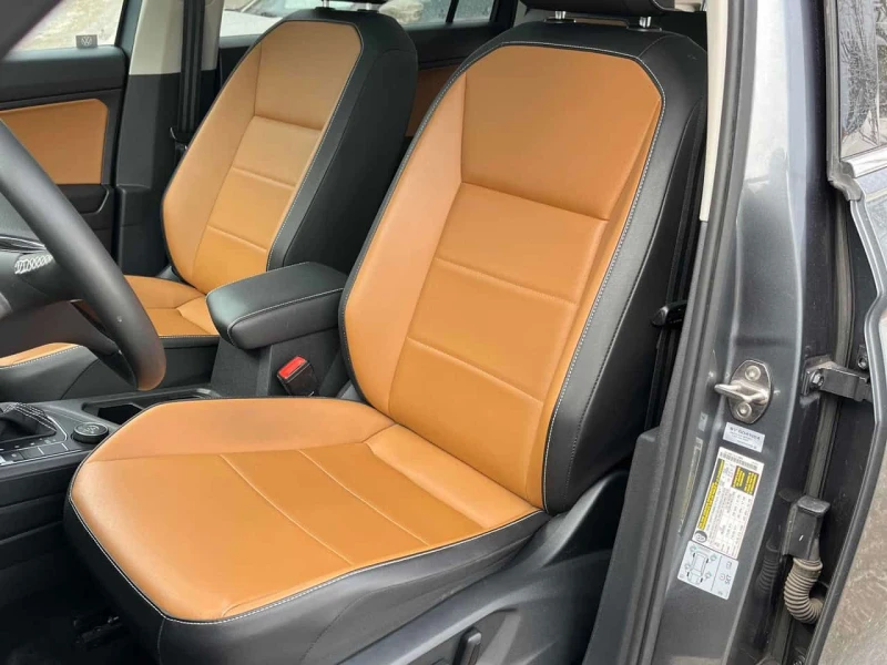 VW Tiguan /4MOTION /CARFAX / Лимитиран салон/Подгрев/Нави/, снимка 7 - Автомобили и джипове - 53569457