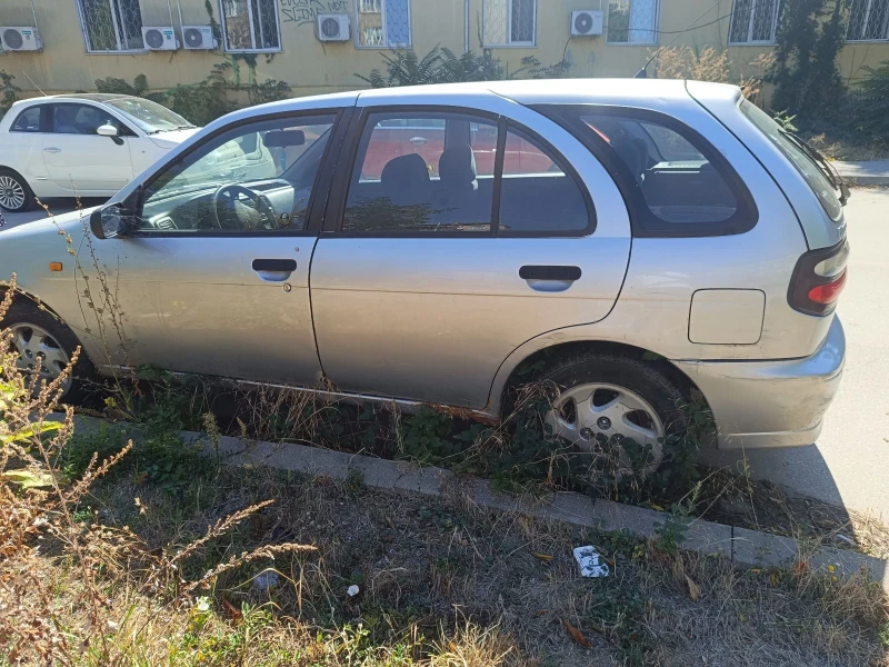 Nissan Almera, снимка 3 - Автомобили и джипове - 51963960