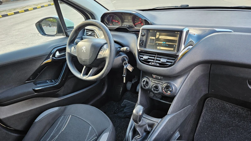Peugeot 208 1.4 Hdi Klima/Navig, снимка 10 - Автомобили и джипове - 52345929