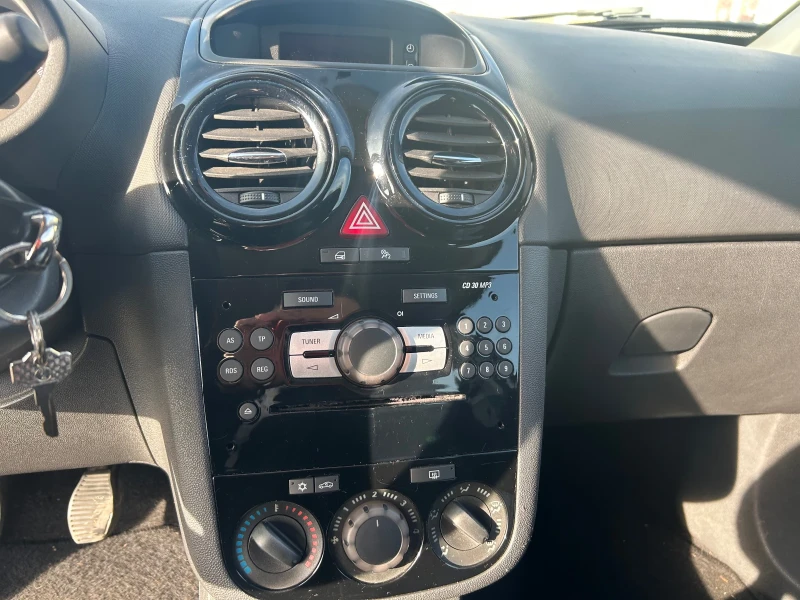 Opel Corsa 1.3cdti evro5B, снимка 9 - Автомобили и джипове - 52847613