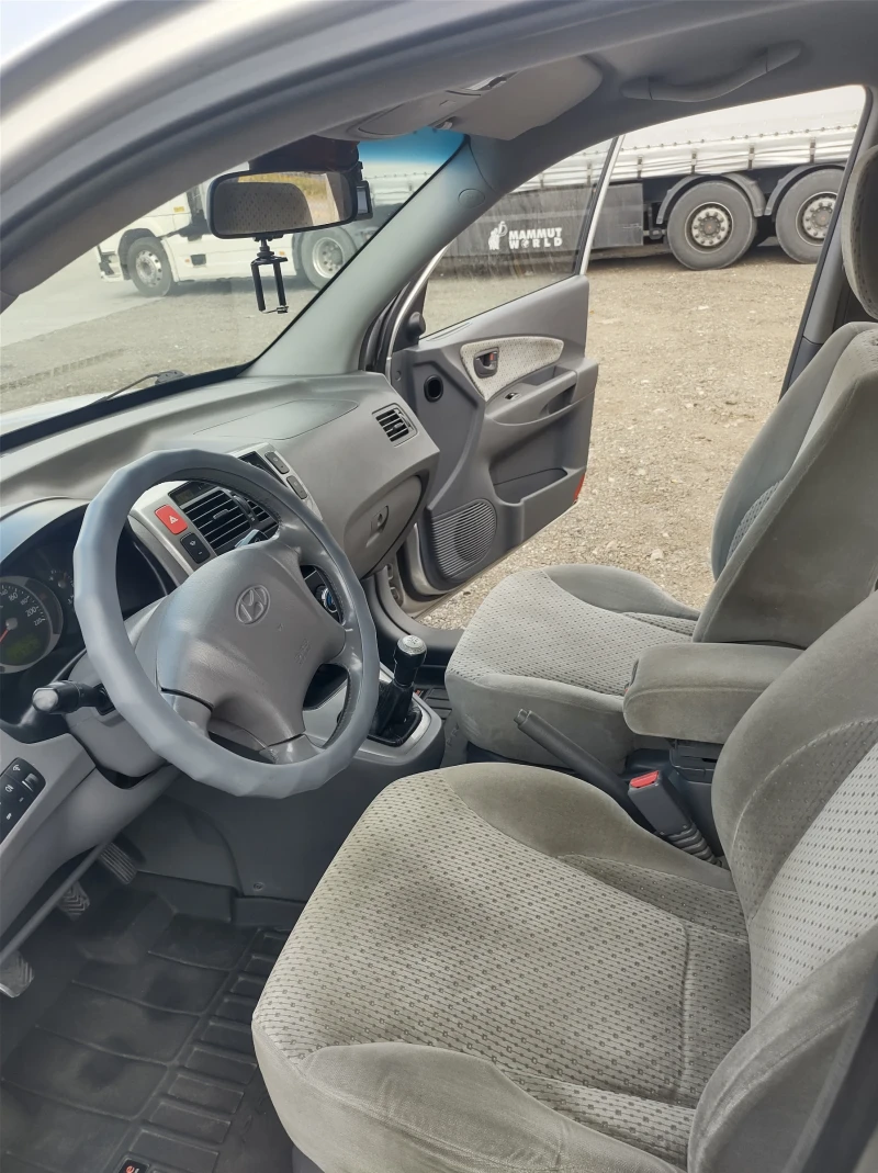 Hyundai Tucson, снимка 11 - Автомобили и джипове - 47798749