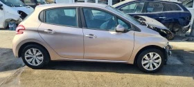 Peugeot 208 1.2i, снимка 11