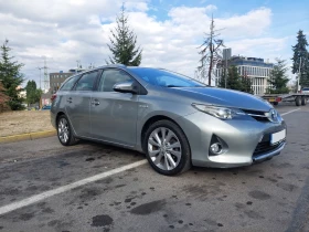 Обява за продажба на Toyota Auris 1, 8 Hybrid ~15 500 лв. - изображение 1 | Auto.bg Обява за продажба на Toyota Auris 1, 8 Hybrid ~15 500 лв. - изображение 1